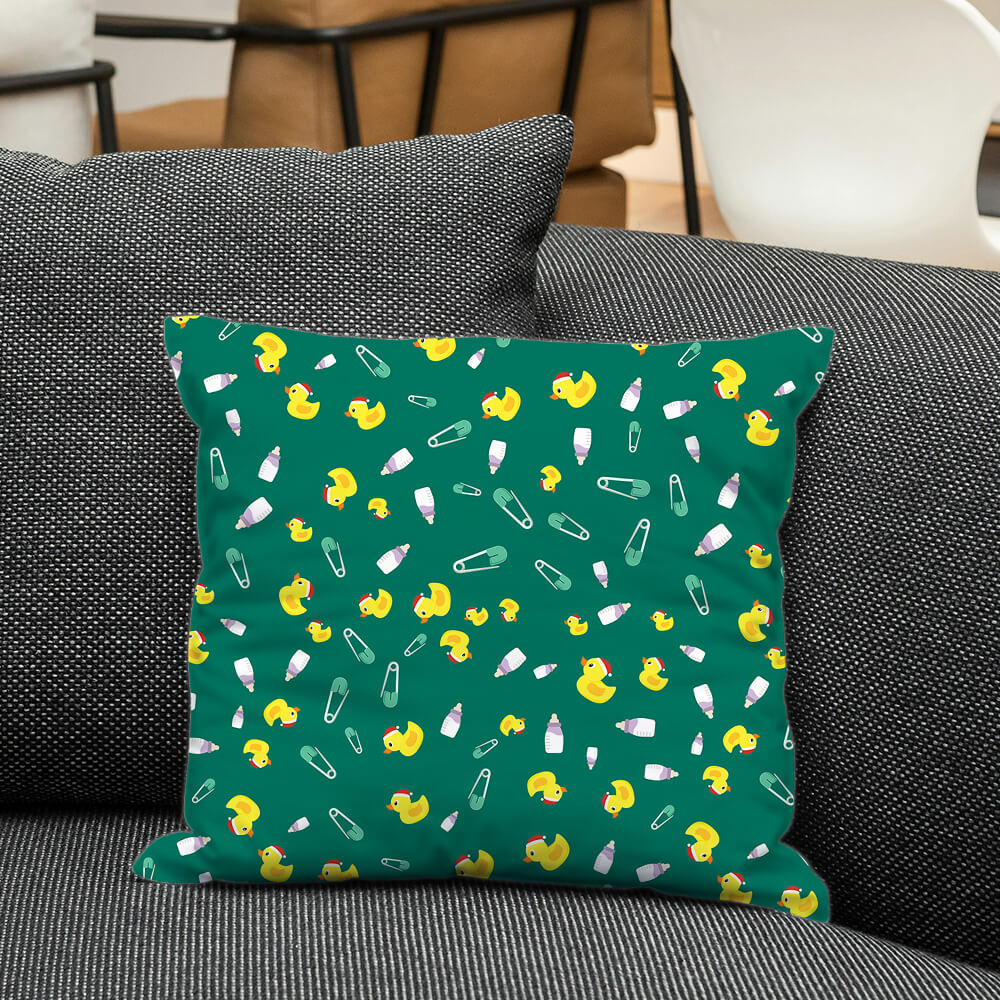 Baby theme cushion with ducks and tiny items on dark green, perfect for adding fun and soft charm to nursery decor.