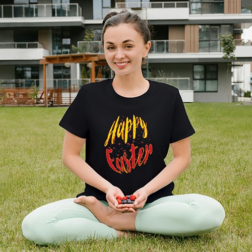 Easter lettering T-shirt design with pastel lettering and small floral accents in a festive creative illustration style.