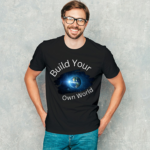 Man wearing black T-shirt with a glowing Earth design and “Build Your Own World” text in a cosmic galaxy theme.