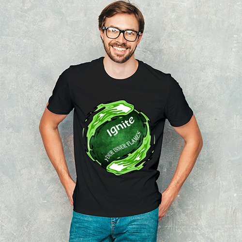 Male model in black T-shirt with bright green Inner Fire design, styled in a relaxed pose with neutral backdrop.
