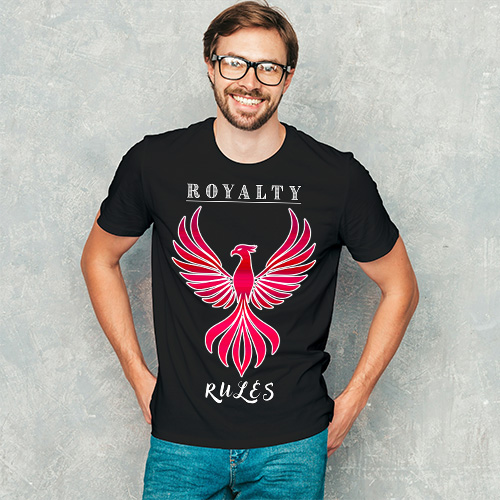 Man wearing a black T-shirt with a red phoenix Royalty Rules graphic, posing casually with hands in pockets.