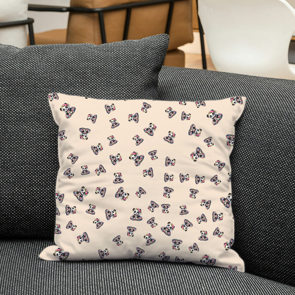 Soft beige cushion featuring tiny princess pandas in repeat, adding warmth and charm to nursery and gift decor.